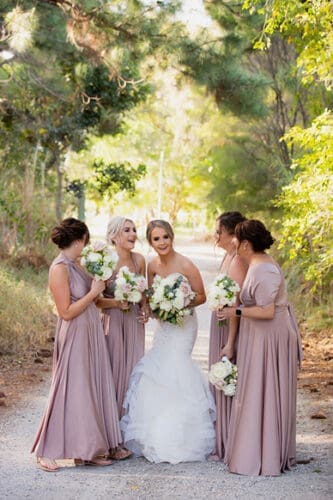 Bride and bridesmaids with bouquets