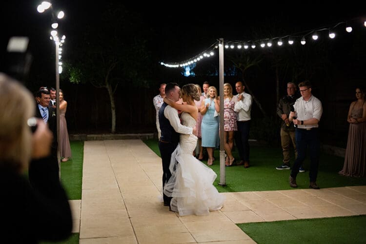 A first dance outdoors at osteria weddings