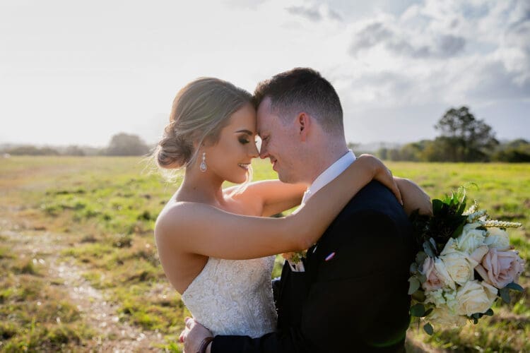  Sunset photo taken of a bride and groom on their wedding day on the tweed coast