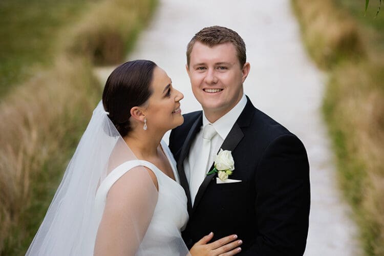 Happy newly married couple outdoors.