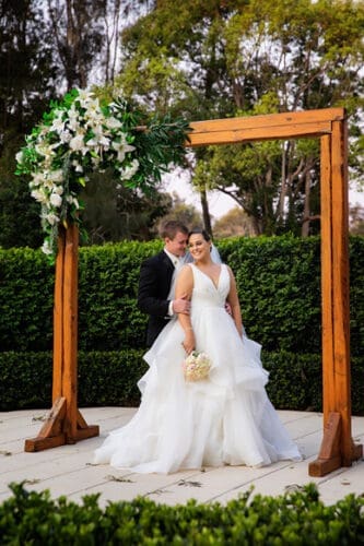 Bride and Groom pose for photo