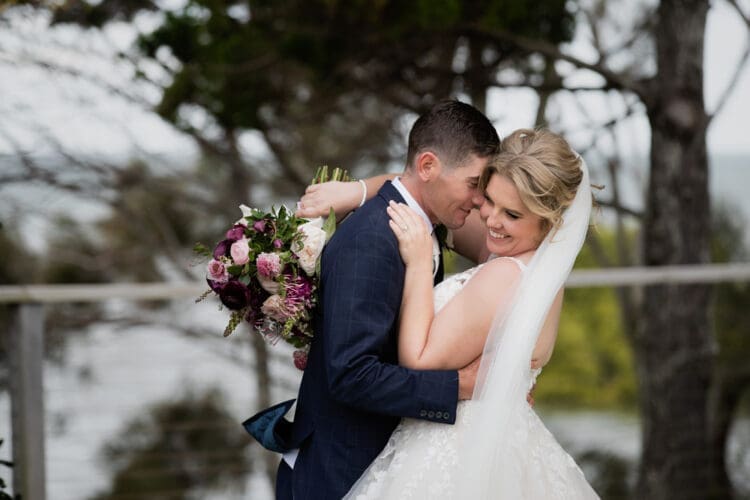 Romantic wedding portrait at Sandstone Point by Leah from Follett Photography