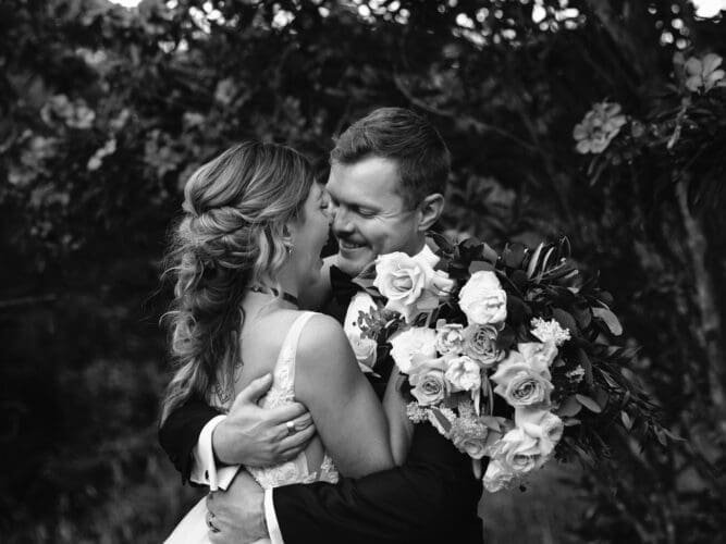 Bride and groom laughing together during a Maleny Manor wedding