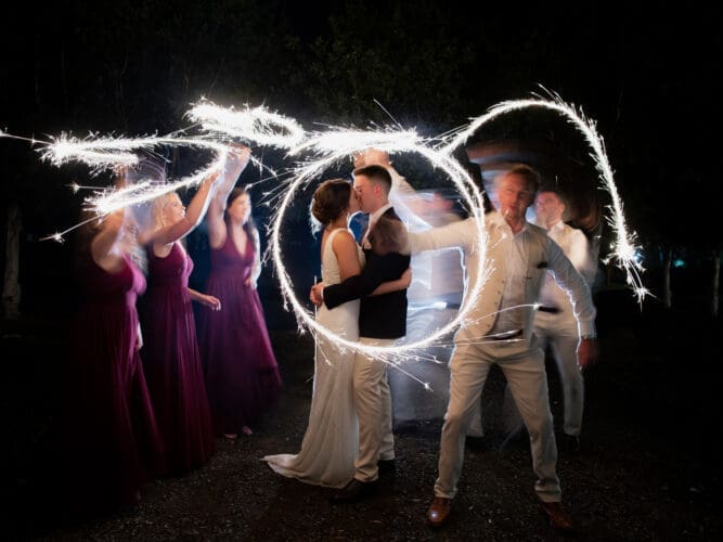 Night wedding photo with sparkler