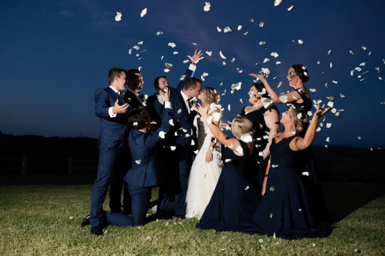 a petal toss night wedding photo