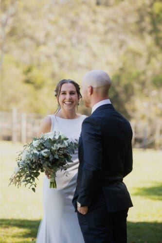 Bride laughing during wedding portraits at Ocean View Estates