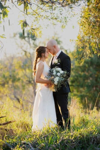 Trish and Nic sharing a private moment during their sunset photo session