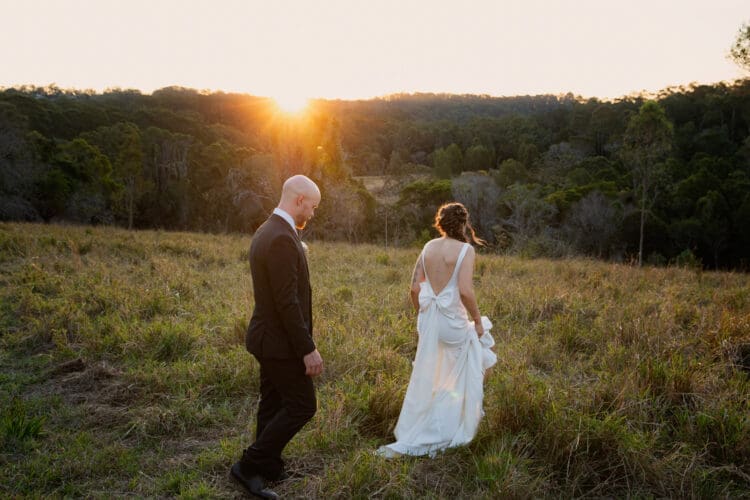 Wedding couple enjoying the golden hour light