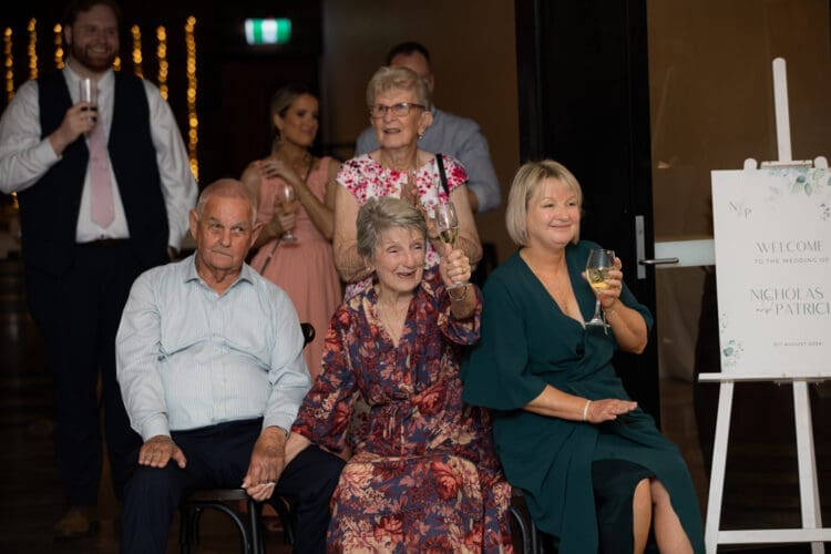 Candid wedding shot of guests dancing at Ocean View