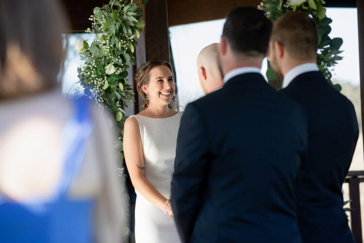 Trish and Nic exchanging vows during their Ocean View Estates ceremony