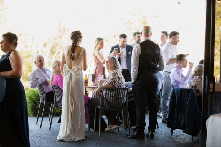 Wedding guests enjoying drinks and appetizers